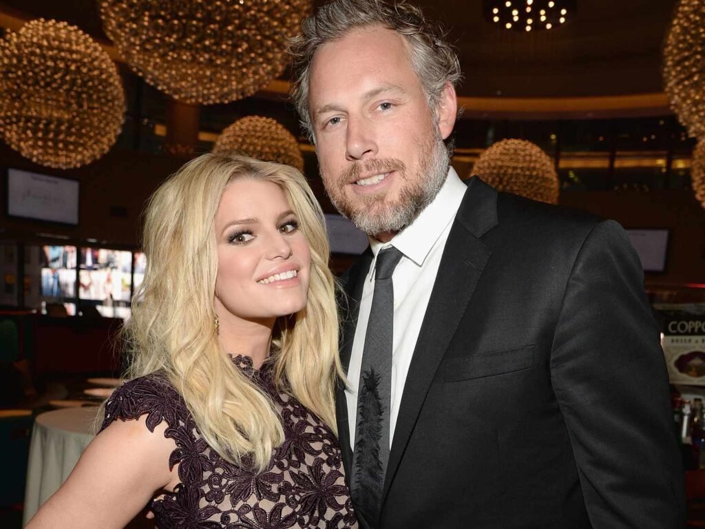 Jessica Simpson and Eric Johnson attending a glamorous event